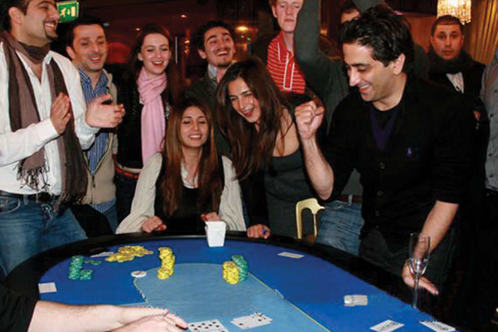 Birthday party casino table hire with guests celebrating