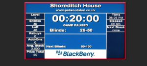 Branded poker tournament software on screen at an event